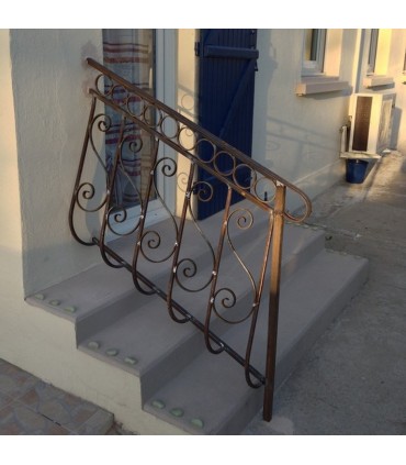 Volute en S 450x170mm en plat de 14x6mm symétrique extrémités forgées pattes d'oie